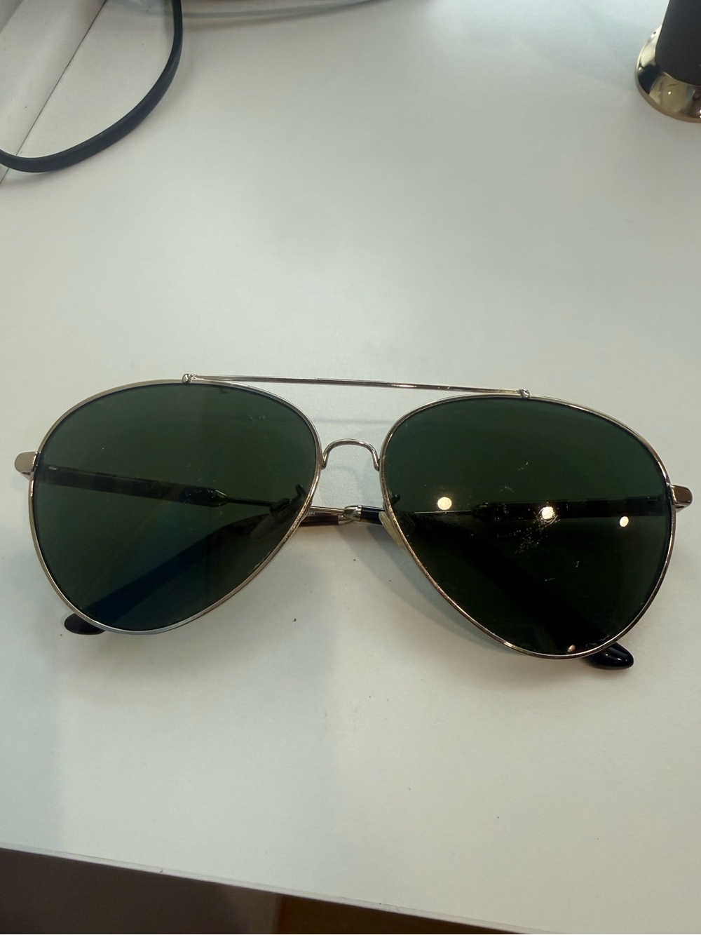 Gold Frame Aviator Sunglasses with Dark Green Lenses
